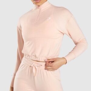 Gymshark pink quarter zip cinched waist cropped